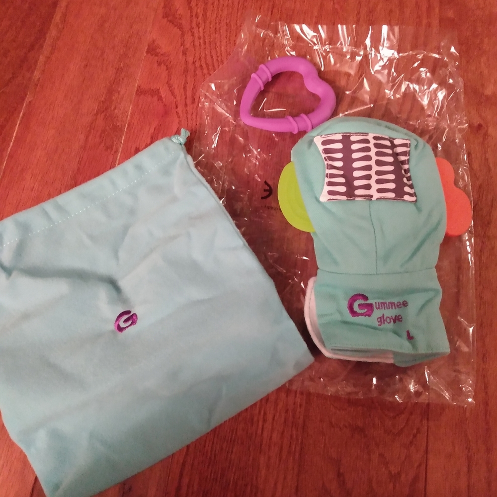 SOLD.         Gummee Glove (309)